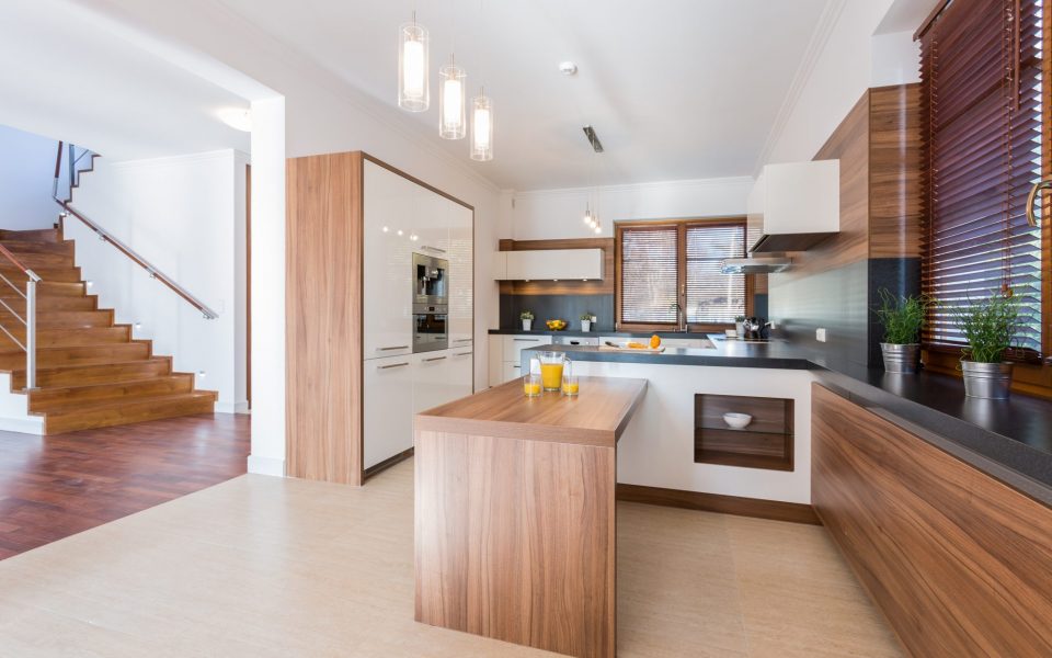 Spacious bright kitchen with wooden units